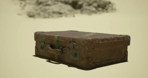 Vintage Travel Suitcase Rotating on Sand for Retro Adventure Concepts