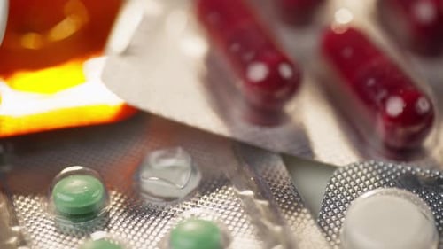 Close Up of Colorful Medicine Pills in Blister Packs