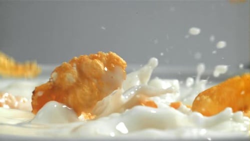 Cornflakes Falling in Slow Motion into Milk