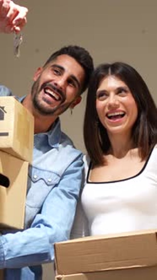 Happy Couple Celebrates New Home Purchase