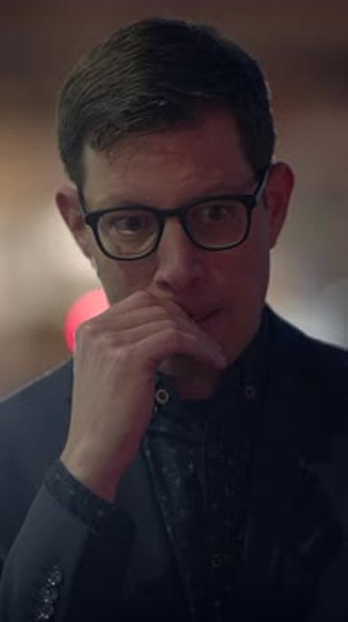 Thoughtful Man with Glasses Ponders Important Decisions