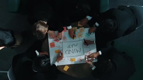 Group of business people brainstorm idea while writing mind map. Directorate.