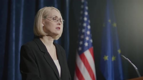 Female Diplomat Delivering Speech at International Summit