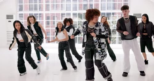 Dance, energy and music with people in studio for choreography, rehearsal or training together