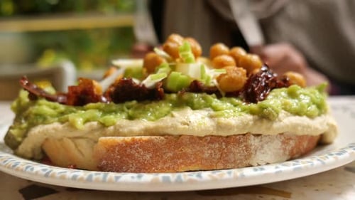 Delicious Toasted Bread with Hummus and Avocado