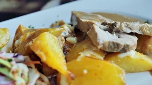 Delicious Food Plate with Meat and Potatoes