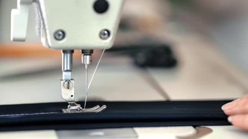 Seamstress Woman Hand Sews Textile Details Use Electric Sewing Machine Thread Dressmaking Closeup