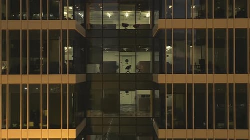 Office building windows after work hours early evening