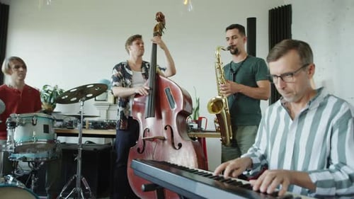 Men Playing Live Jazz Music in Studio