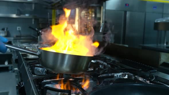 Metal Pan Flambe in a Commercial Kitchen, Food Stock Footage ft ...