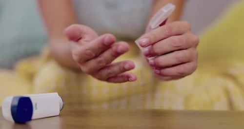 Woman Pours Pills into Hand