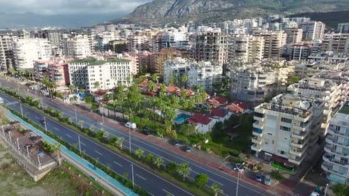 Aerial Video Stunning Vintage Villas Captured Aerially in a Scenic Complex with Greenery and