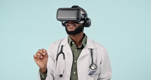 Man in Lab Coat Uses Virtual Reality Headset