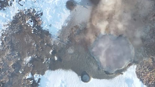 Above active mud pool emitting steam, unique Icelandic mudpot, Gunnuhver