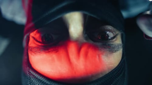 Thief With Balaclava Is Forcing The Lock Safe Door Of A Jewelry Store