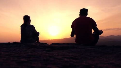 Silhouette Of Couple Admire Sunset And Landscape Standing On Hill, Super Slow Motion 240fps