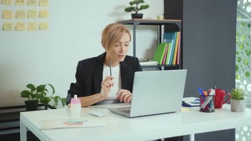 Businesswoman Working in the Office Sitting at Desk Use Laptop Computer Smiling Workplace Computer