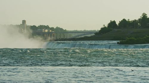Horseshoe Falls with the Rainbow Bridge in the background