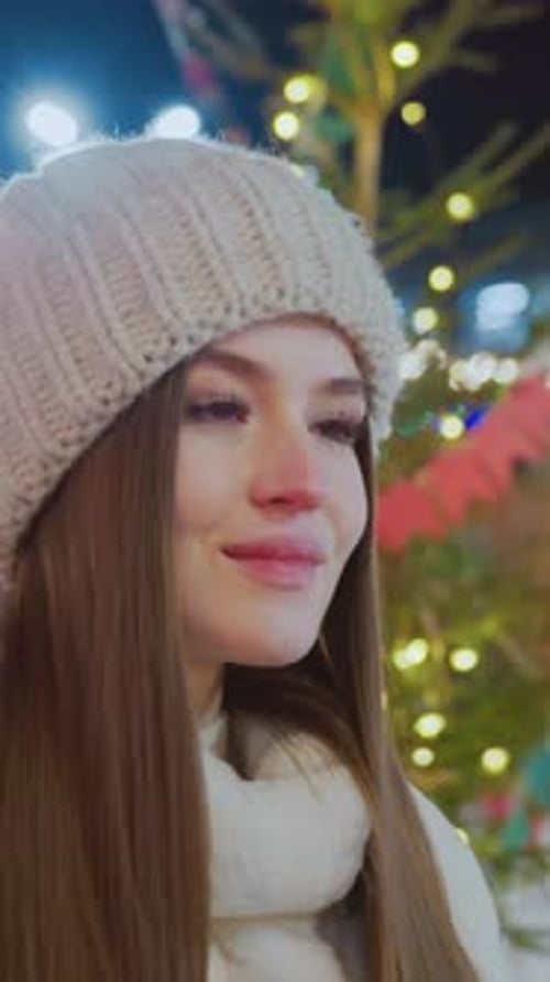 Smiling Woman Wearing a Winter Hat and Scarf