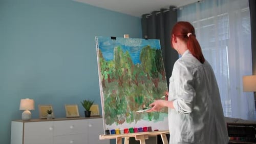 Woman Painting a Landscape in Living Room