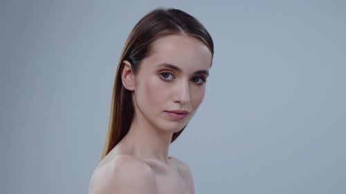 Young Adult Woman Posing in Studio Setting