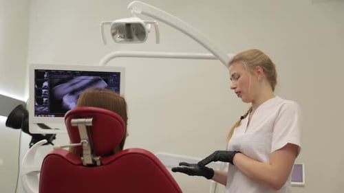 Doctor Explains X-ray in Bright Medical Office