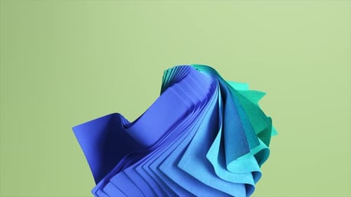 Fashion Concept A Stack of Flying Square Colored Pieces of Fabric Rotating on Isolated Background