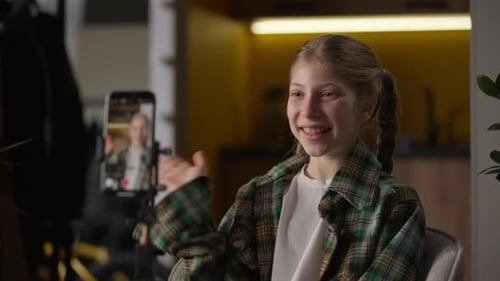 Happy Caucasian Little Kid Girl Child Influencer Blogger Schoolgirl Record Video Blog Waving Hello