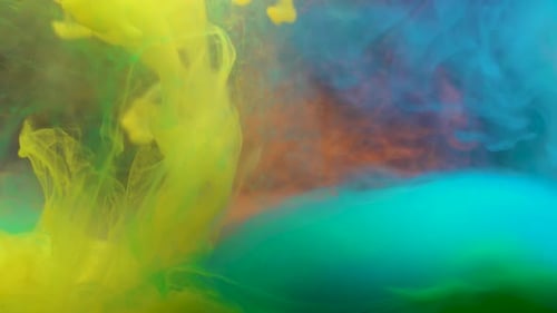 Yellow Ink Swirls in Water