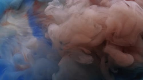 Colorful Ink Swirling Slowly in Water