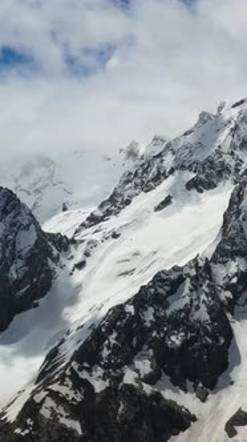Scenic Aerial View of Snow Covered Mountain