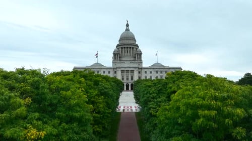 Rising aerial shot of the Rhode Island state Capitol in Providence. American state government buildi