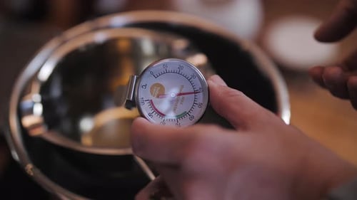 Measuring the Temperature of Coconut Wax Melted in a Water Bath
