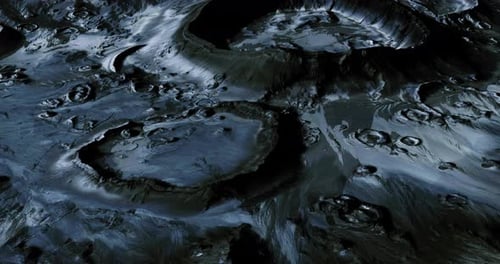 Detailed Close Up of the Moons Surface Showcasing Craters and Textures