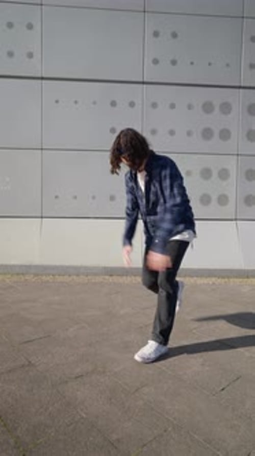 Vertical Video Stylish Male Street Dancer Dancing Hip Hop on Urban Background