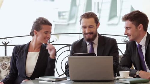 Businesspeople Sitting at Restaurant