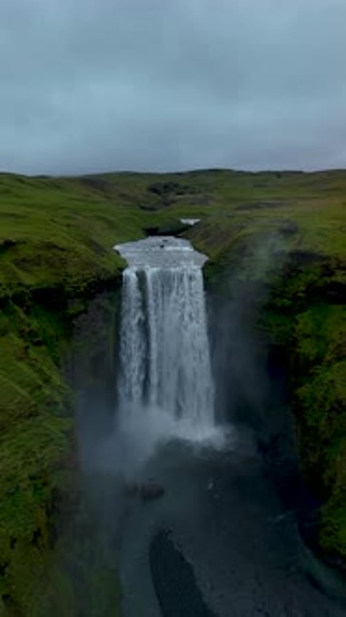 Dramatic Landscape of Skogafoss Waterfall Flowing From Volcanic Mountain in South of Iceland