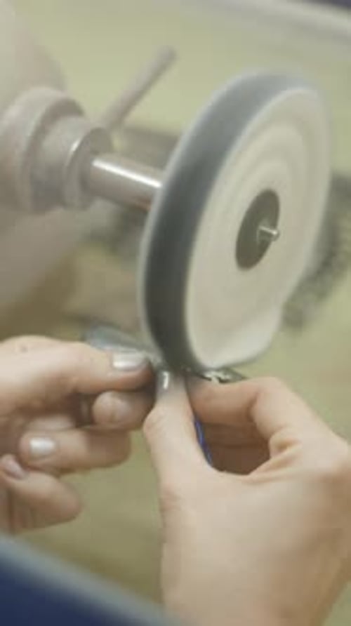 Silver Pet Accessory Polish Into Enclosed Grinding Table Polisher Selective Focus Shot