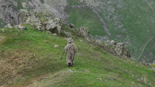 Camouflaged Photographer