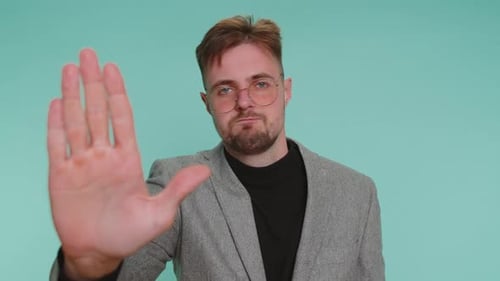 Business Man Say No Hold Palm Crossed Hands in Stop Gesture Warning of Finish Prohibited Access