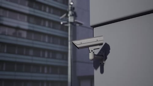 Outdoor CCTV Security Camera Mounted on Building Wall with Blurred City
