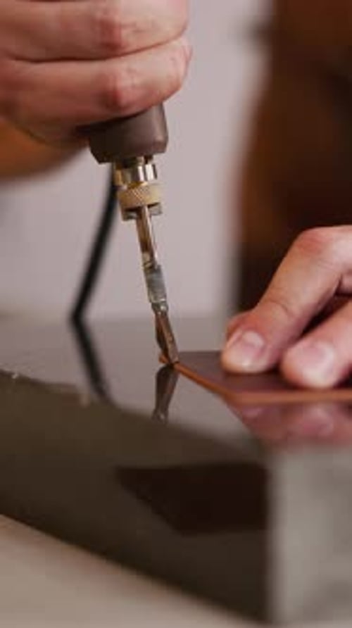 Artisan Uses Soldering Iron to Burnish Leather