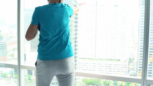 Sporty Man Exercising Boxing by Window in Gym, Super 240