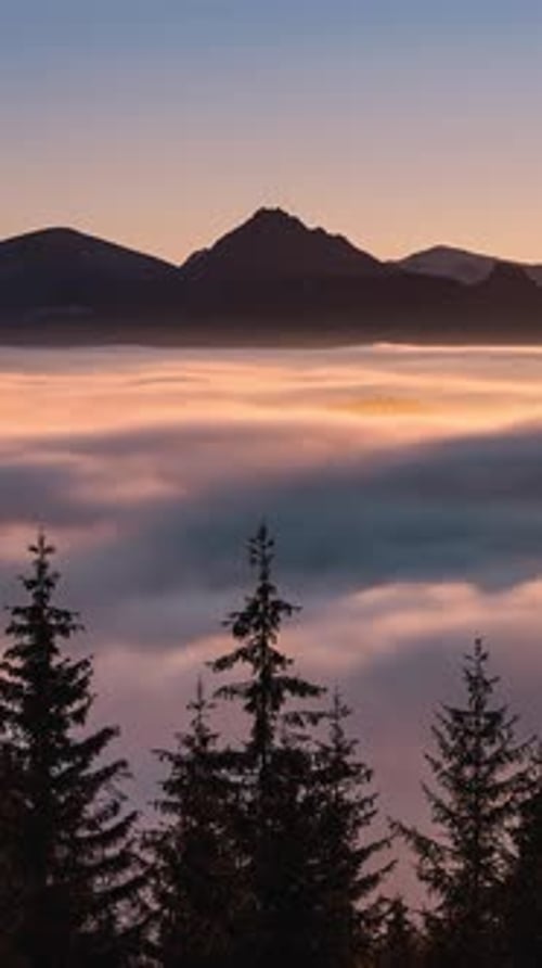 Foggy Mountains in Peaceful Nature Landscape at Sunset Vertical Time Lapse