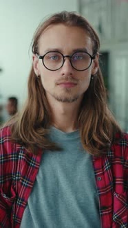 Young Adult Portrait with Brown Hair and Glasses