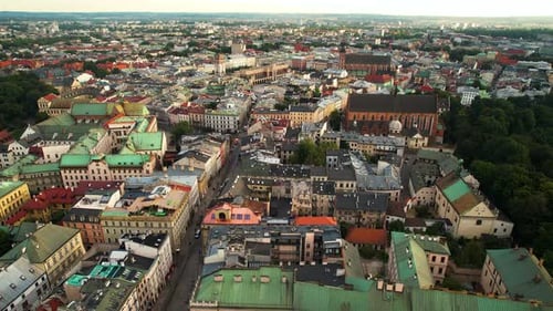 Aerial drone shot over beautiful old city of Cracow (Krakow) in Poland at sunrise