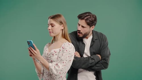 Suspicious Man Spying On Girlfriend Chats With Smartphone Jealousy Curiosity