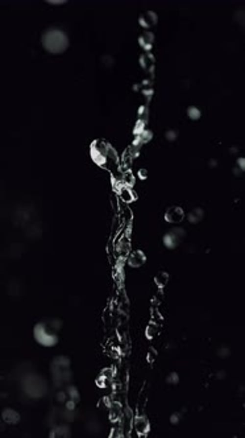 Close-Up Splash Of Water In Slow Motion