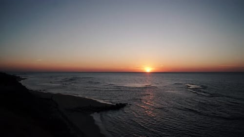 Beautiful sunset at the beach Timelapse. 4K