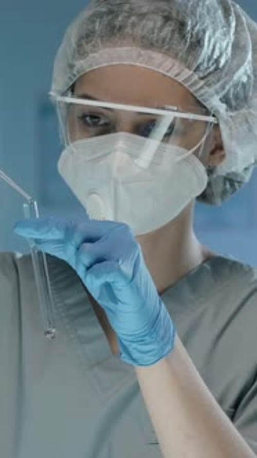 Close Up of Lab Work With Test Tube